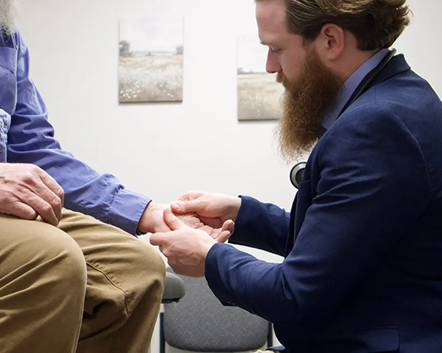 Dr. Fisher treating a patient